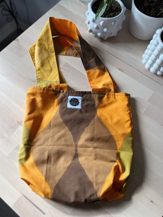 brown and orange tote bag